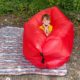 kid in inflatable lounger