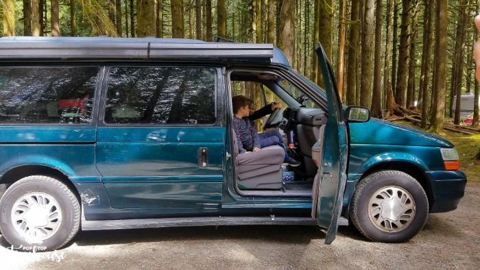 kids in driving seat of camper